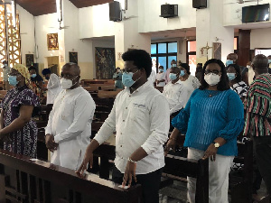 Daniel Domelevo (middle) in church for thanksgiving