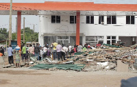 Demolished fuel station at Mile 7