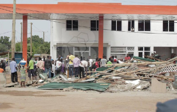 Demolished fuel station at Mile 7