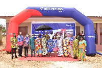 Officials of Airteltigo, headmaster of the schools, others in a group photograph