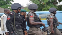 Nigeria army, police smoke out armed robbers holed up in bank