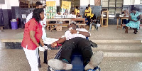 A student donating his blood