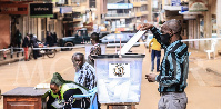 A man casts his vote during the 2016 General Election in Kampala