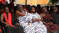 Ebony's parents in white mourning clothes