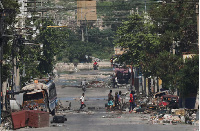 The missionaries were attacked while taking shelter in a house