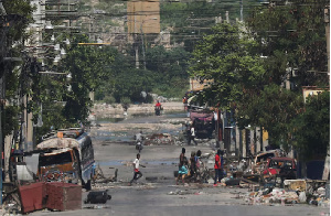 The missionaries were attacked while taking shelter in a house