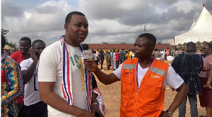 Ashanti Regional chairman, Bernard Antwi Boasiako Wontumi (L) speaking to a journalist