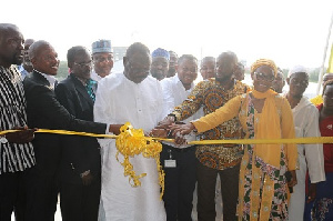 Sheikh I.C  Quaye cuts the sword at the renovated Hajj Village