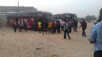 Some customers boarding one of the buses