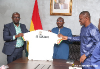 Vice President Dr. Mahamudu Bawumia holding the new Black Stars jersey