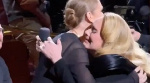 Adele hugs Celine Dion