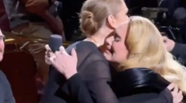 Adele hugs Celine Dion