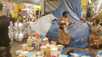 Some traders and wares at the Kejetia market