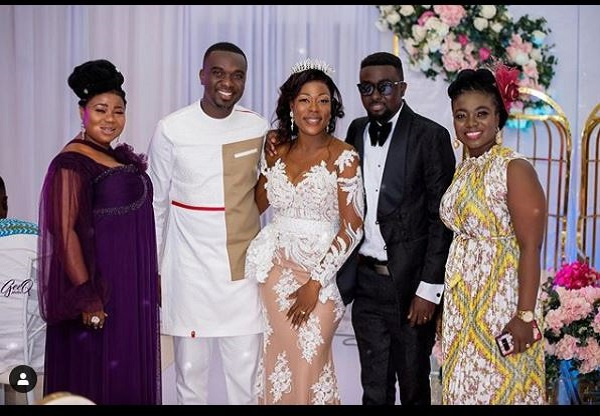 Joe Mettle, Abena Ophelia, Stacy Amoateng and another in a group photo with the new bride