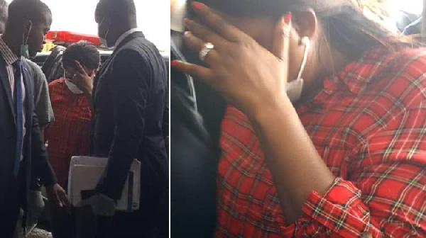 Funke Akindele arriving in court in Lagos covering her face. Photo: The Punch