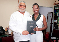 Gwendolyne Brown with late President Jerry John Rawlings