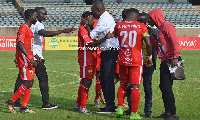 A happy Akonnor with his players after the game