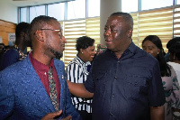 Mr. Basil Sennor (Left) interacting with the CEO of the Ghana Exim Bank Mr. Lawrence Agyinsam(Right)