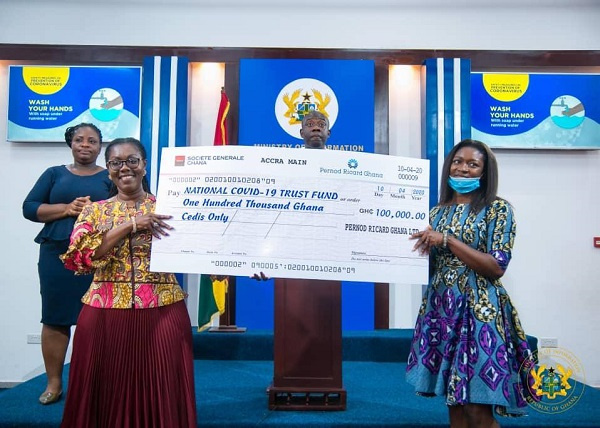 Eunice Osei-Tutu, Corporate Relations Manager at Pernod Ricard presenting the cheque to Ursula Owusu