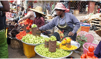 Scores of Traders at a market - File photo