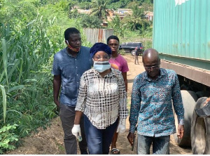 Gifty Ohene-Konadu  during a visit at the Tiles Cement processing company at Gomoa Akotsi