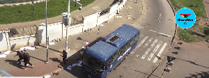 The protestors destroyed the glass windows of the police bus