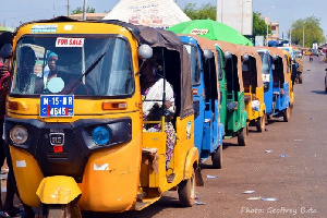 A tricycle transporting passengers