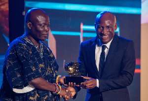 Dr. Prosper Narteh Ogum received his award from former Sports Minister, Edwin Nii Lante Vanderpuye