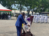 Dominic Nitiwul laying wreath