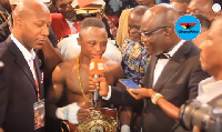 Ghanaian-British boxer Isaac Dobgoe (middle)