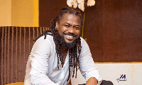 Samini beaming with smiles