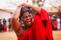 File photo of a woman crying at a funeral