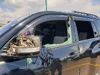 A damaged photo of a car in Ruto's convoy