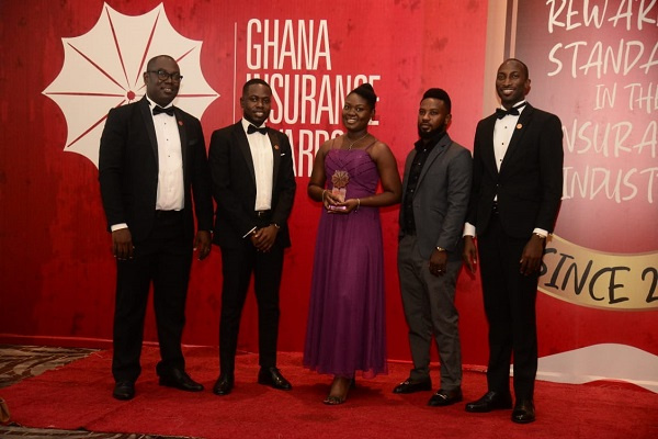 Staff of Bima Insurance with the award