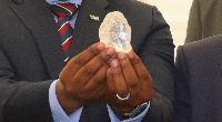 An official displays the 1,098.30-carat diamond in Botswana capital Gaborone