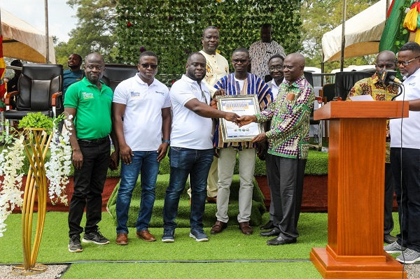 Alex Kofi Annin General manager of Newmont Africa Ahafo Mine receiving a citation