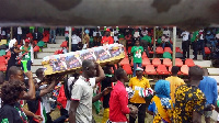 NDC supporters carrying mockery coffin of Nana Addo at the NDC manifesto launch