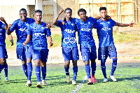 Accra Lions players celebrate their first goal in the match against Tema Youth