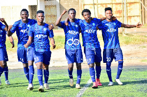 Accra Lions players celebrate their first goal in the match against Tema Youth