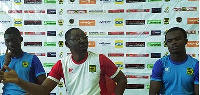 Coach David Duncan flanked by his skipper Amos Frimpong and another player