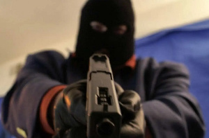 The two masked men armed with pump action guns bolted with Ghc 15,700.00,