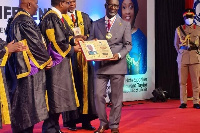 Justice Edward Amoako Asante receiving his award