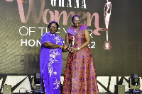 Madam Akosua Frema Osei-Opare (left) receiving an award