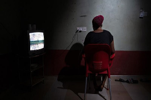 Blessing, a 26-year-old from Nigeria, inside the guesthouse where she lives with other 20 women