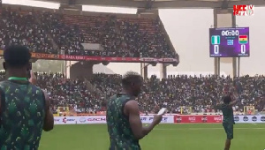 Super Eagles players greet fans ahead of the March 28 clash in Abuja