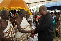 Mahama shakes hand with Acting Kwahu Chief upon inspecting the Kwaku Water Project at Kotoso