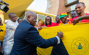 Akufo Addo Signs Giant Ghana Flag