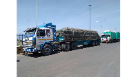 Trucks loaded with maize from Tanzania parked at the Namanga border