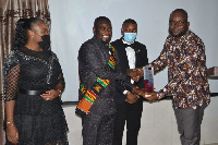 Dr. Adu Boateng receiving the award