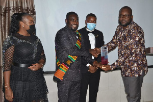 Dr. Adu Boateng receiving the award